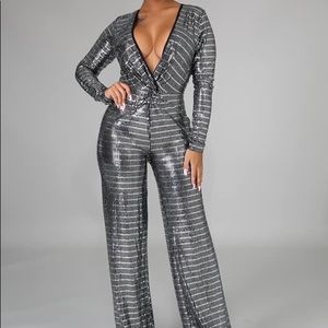 Stella Jumpsuit, long sleeve cotton material, outfit is exactly like picture.